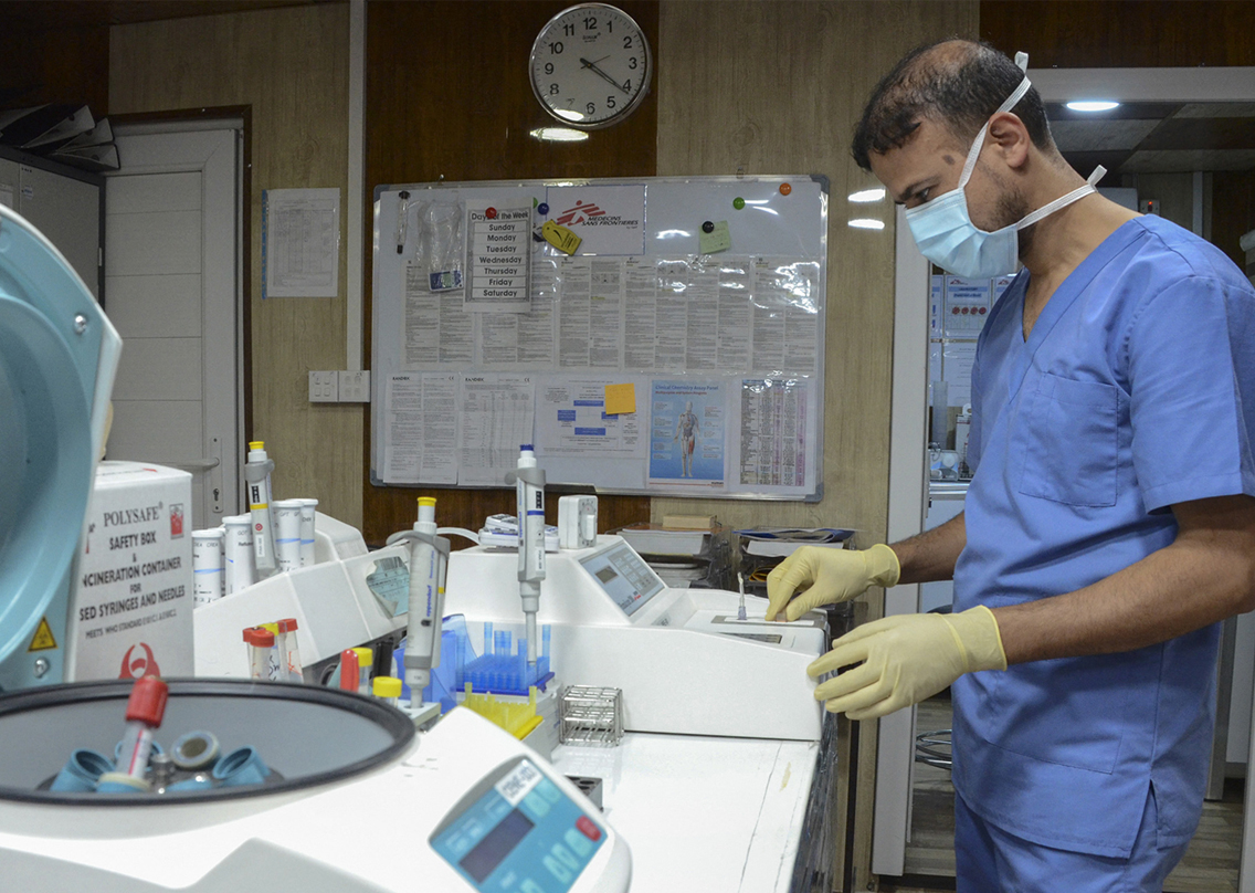 A medic works at a laboratory at the Nablus hospital, run by Doctors Without Borders (MSF), in Iraq's northern city of Mosul, Dec. 16, 2021. (Photo: Zaid al-Obeidi/AFP)